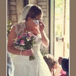 Bride wiping tears before Church wedding service in Newton Ferrers in Devon