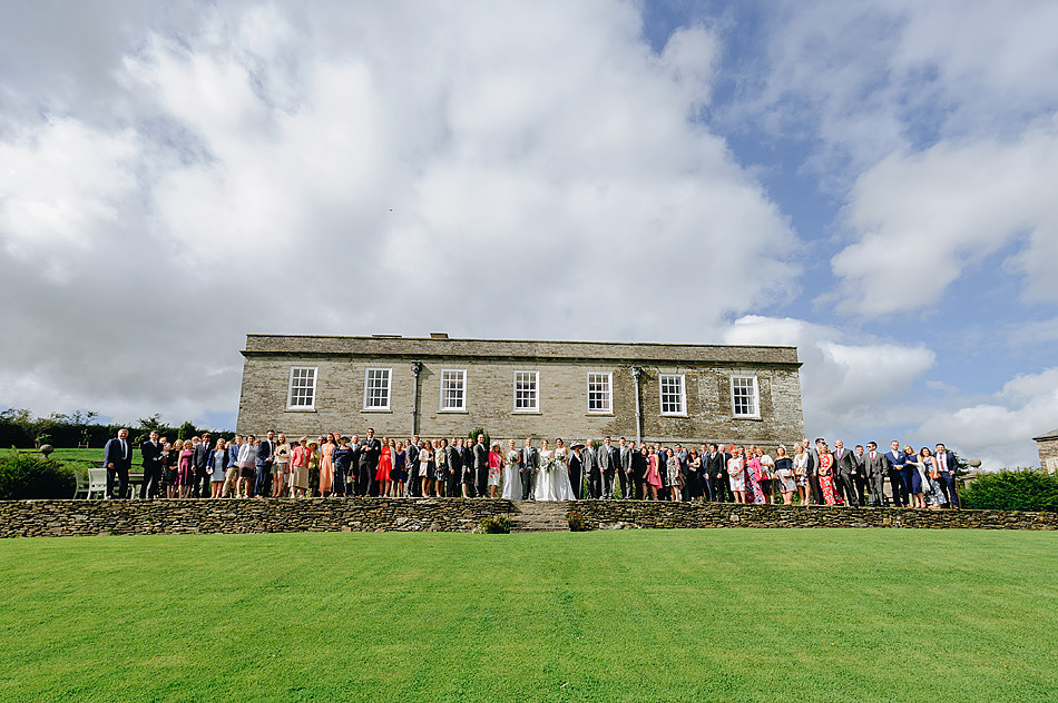 Shilstone house wedding group shot in front of the house